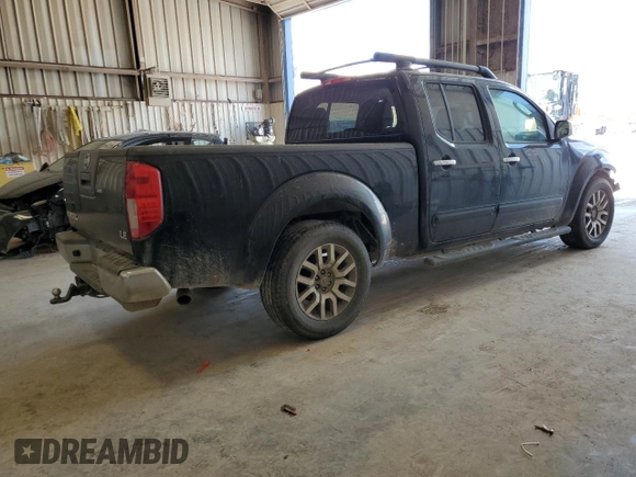 2009 Nissan Frontier LE with VIN 1N6AD09U79C409698, listed as a Copart auction lot 55843545 with 230,334 mi miles and Salvage title. Bid and sale history available at DreamBid. Image 3.