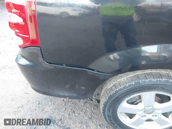 2012 Dodge Grand Caravan SXT with VIN 2C4RDGCG3CR318900, listed as a IAAI auction lot 41145958 with 201,117 mi miles and . Bid and sale history available at DreamBid. Image 13.