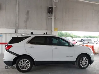 2018 Chevrolet Equinox LT z VIN 3GNAXJEV2JL285919, wystawiony jako IAAI lot #42417524 z przebiegiem 79 402 mil mil oraz . Historia ofert i sprzedaży dostępna na DreamBid. Obrazek 13.