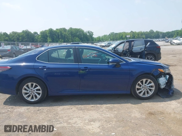 2023 Toyota Camry LE z VIN 4T1R11AK9PU180068, wystawiony jako IAAI lot #42483656 z przebiegiem 59 312 mil mil oraz . Historia ofert i sprzedaży dostępna na DreamBid. Obrazek 13.