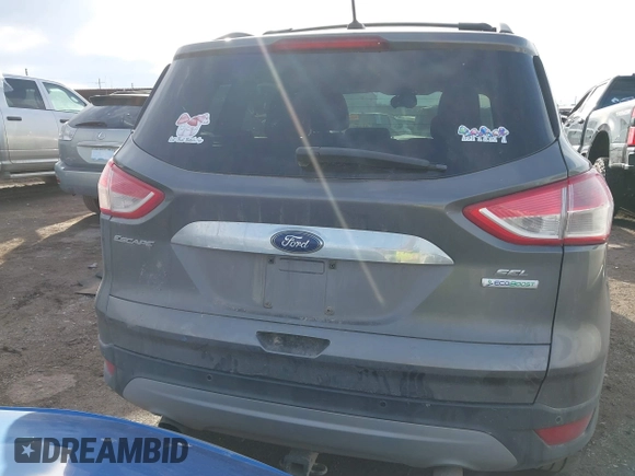 2013 Ford Escape SEL with VIN 1FMCU0HX1DUD51965, listed as a IAAI auction lot 41667262 with 164,493 mi miles and . Bid and sale history available at DreamBid. Image 16.