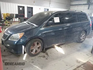 2010 Honda Odyssey Touring with VIN 5FNRL3H98AB095042, listed as a IAAI auction lot 41394894 with 254,525 mi miles. Bid and sale history available at carsss.com. Image 2.