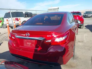 2016 Nissan Altima SR with VIN 1N4AL3AP5GC128614, listed as a IAAI auction lot 41625773 with 123,549 mi miles and . Bid and sale history available at DreamBid. Image 16.