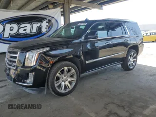 2015 Cadillac Escalade Premium with VIN 1GYS4NKJ8FR612400, listed as a Copart auction lot 60831925 with 101,999 mi miles and Salvage title. Bid and sale history available at DreamBid. Image 1.