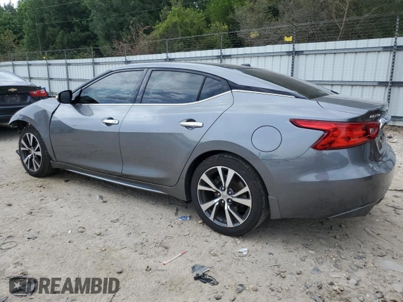 2016 Nissan Maxima SL with VIN 1N4AA6AP0GC379967, listed as a Copart auction lot 60839615 with 107,201 mi miles and Salvage title. Bid and sale history available at DreamBid. Image 2.