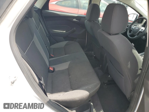 2013 Ford Focus SE z VIN 1FADP3F29DL374088, wystawiony jako Copart lot #59585135 z przebiegiem 74 997 mil mil oraz Szkoda całkowita • Salvage title. Historia ofert i sprzedaży dostępna na DreamBid. Obrazek 10.