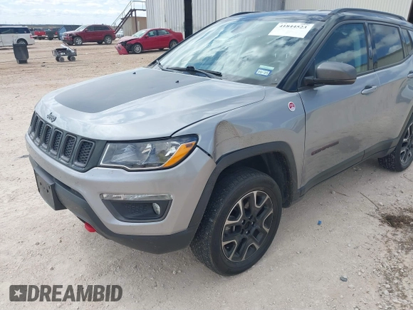 2020 Jeep Compass Trailhawk z VIN 3C4NJDDB5LT171727, wystawiony jako IAAI lot #41844523 z przebiegiem 103 952 mil mil oraz . Historia ofert i sprzedaży dostępna na DreamBid. Obrazek 6.