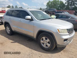 2012 Jeep Grand Cherokee Laredo with VIN 1C4RJEAG4CC251359, listed as a IAAI auction lot 41986762 with 172,331 mi miles. Bid and sale history available at carsss.com. Image 1.