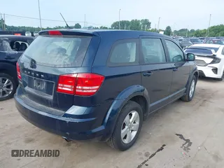 2013 Dodge Journey American Value with VIN 3C4PDCAB2DT529530, listed as a IAAI auction lot 42798001 with Not provided miles and . Bid and sale history available at DreamBid. Image 4.