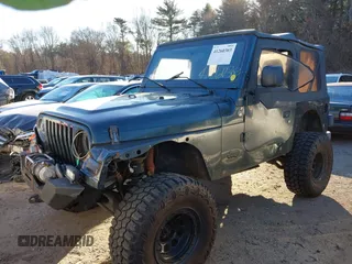 2005 Jeep Wrangler SE with VIN 1J4FA29155P366432, listed as a IAAI auction lot 41260303 with 134,021 mi miles. Bid and sale history available at carsss.com. Image 2.
