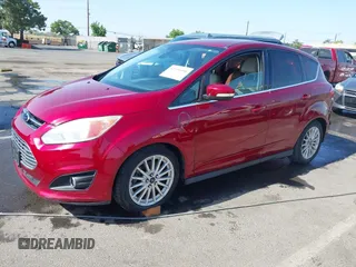 2013 Ford C-Max SEL z VIN 1FADP5CU4DL555035, wystawiony jako IAAI lot #42355498 z przebiegiem 172 374 mil mil oraz . Historia ofert i sprzedaży dostępna na DreamBid. Obrazek 2.
