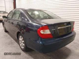 2003 Toyota Camry LE with VIN 4T1BE30K03U152348, listed as a IAAI auction lot 42082892 with 224,721 mi miles and . Bid and sale history available at DreamBid. Image 3.
