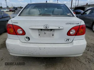 2004 Toyota Corolla CE with VIN 1NXBR32E94Z291049, listed as a Copart auction lot 56949865 with 148,919 mi miles and Clean Title. Bid and sale history available at DreamBid. Image 6.