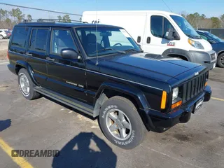 1999 Jeep Cherokee Sport with VIN 1J4FT68S2XL609913, listed as a IAAI auction lot 41425279 with 158,184 mi miles. Bid and sale history available at carsss.com. Image 1.