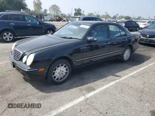 2002 Mercedes-Benz E-Class with VIN WDBJF82JX2X064384, listed as a Copart auction lot 53058325 with 188,440 mi miles and Salvage Title. Bid and sale history available at carsss.com. Image 1.