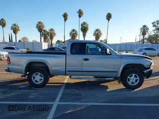 2000 Dodge Dakota Sport with VIN 1B7GG22N6YS690223, listed as a IAAI auction lot 41244256 with 147,443 mi miles. Bid and sale history available at carsss.com. Image 13.