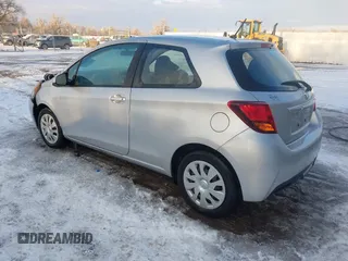 2015 Toyota Yaris L with VIN VNKJTUD36FA036518, listed as a IAAI auction lot 41233406 with 138,481 mi miles. Bid and sale history available at carsss.com. Image 3.