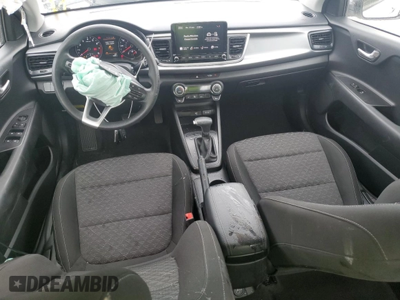 2023 Kia Rio S with VIN 3KPA24AD3PE573452, listed as a Copart auction lot 68249544 with 12,001 mi miles and Non Repairable. Bid and sale history available at DreamBid. Image 8.