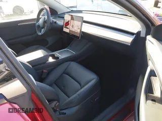 2025 Tesla Model Y Long Range with VIN 7SAYGDED8SF223993, listed as a IAAI auction lot 41743146 with 4,866 mi miles and . Bid and sale history available at DreamBid. Image 5.