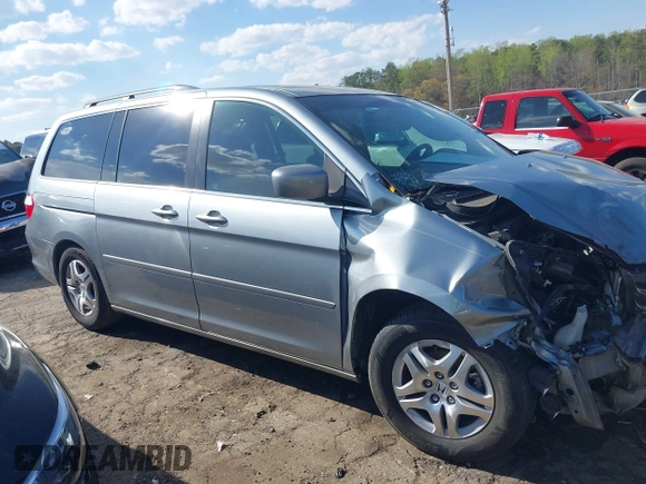 2007 Honda Odyssey EX-L with VIN 5FNRL38677B054173, listed as a IAAI auction lot 41888792 with 142,438 mi miles and . Bid and sale history available at DreamBid. Image 13.