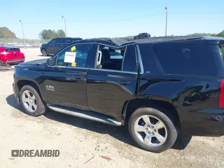 2015 Chevrolet Tahoe LT with VIN 1GNSCBKC8FR268891, listed as a IAAI auction lot 41964602 with 175,035 mi miles and . Bid and sale history available at DreamBid. Image 6.
