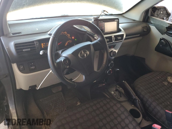 2012 Scion iQ z VIN JTNJJXB09CJ012794, wystawiony jako Copart lot #52983435 z przebiegiem 135 927 mil mil oraz Szkoda całkowita • Salvage title. Historia ofert i sprzedaży dostępna na DreamBid. Obrazek 8.