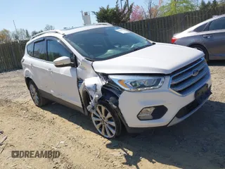 2017 Ford Escape Titanium with VIN 1FMCU9J96HUE21191, listed as a IAAI auction lot 42006013 with 71,786 mi miles. Bid and sale history available at carsss.com. Image 1.