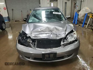 2005 Honda Civic LX with VIN 2HGES16585H511369, listed as a Copart auction lot 50573995 with 134,894 mi miles and Salvage Title. Bid and sale history available at DreamBid. Image 5.