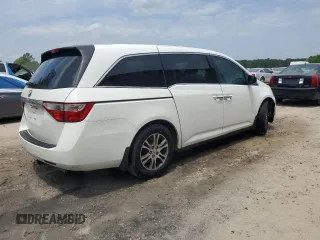 2013 Honda Odyssey EX z VIN 5FNRL5H43DB055987, wystawiony jako Copart lot #54001985 z przebiegiem 162 448 mil mil oraz Szkody całkowita. Historia ofert i sprzedaży dostępna na DreamBid. Obrazek 3.