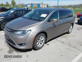 2018 Chrysler Pacifica Touring Plus with VIN 2C4RC1FG4JR306554, listed as a IAAI auction lot 41984255 with 107,109 mi miles and . Bid and sale history available at DreamBid. Image 2.