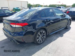 2020 Toyota Corolla SE with VIN JTDS4RCE9LJ026300, listed as a IAAI auction lot 42027274 with 112,829 mi miles. Bid and sale history available at carsss.com. Image 4.