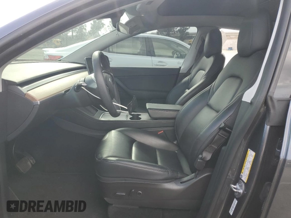 2021 Tesla Model Y Long Range with VIN 5YJYGDEE6MF200883, listed as a Copart auction lot 51707405 with 59,820 mi miles and Salvage Title. Bid and sale history available at DreamBid. Image 7.