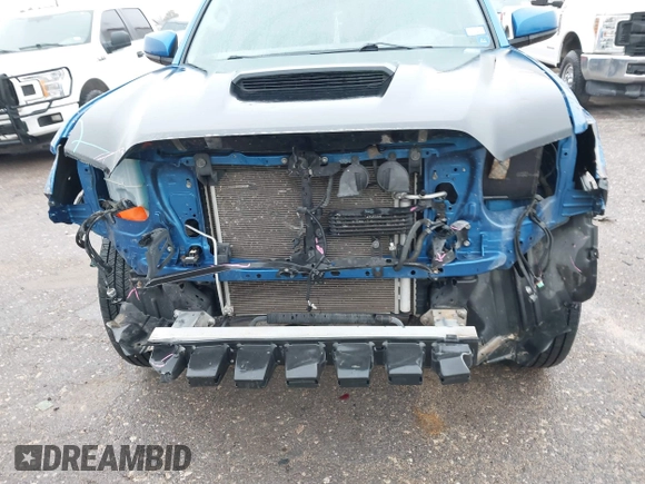 2016 Toyota Tacoma SR with VIN 5TFCZ5AN4GX013233, listed as a IAAI auction lot 41394610 with 142,099 mi miles and . Bid and sale history available at DreamBid. Image 6.