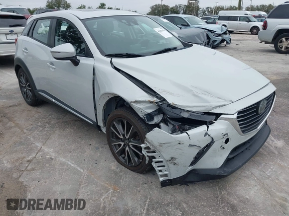 2016 Mazda CX-3 Grand Touring with VIN JM1DKDD72G0128891, listed as a IAAI auction lot 41401456 with 60,911 mi miles. Bid and sale history available at carsss.com. Image 6.