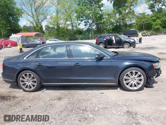 2015 Audi A8 4.0T with VIN WAU32AFD4FN002477, listed as a IAAI auction lot 42157514 with 151,729 mi miles and . Bid and sale history available at DreamBid. Image 13.