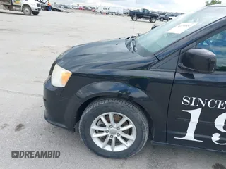 2014 Dodge Grand Caravan SXT z VIN 2C4RDGCGXER388459, wystawiony jako IAAI lot #42350937 z przebiegiem 149 276 mil mil oraz . Historia ofert i sprzedaży dostępna na DreamBid. Obrazek 12.