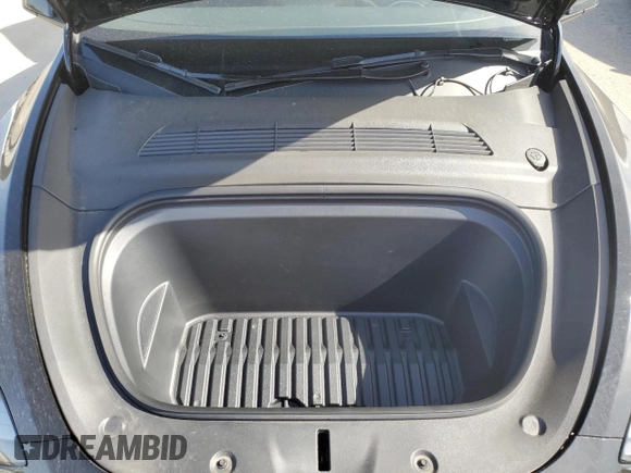 2024 Tesla Model Y with VIN 7SAYGDED0RF131495, listed as a Copart auction lot 56849765 with 10,120 mi miles and Salvage title. Bid and sale history available at DreamBid. Image 12.
