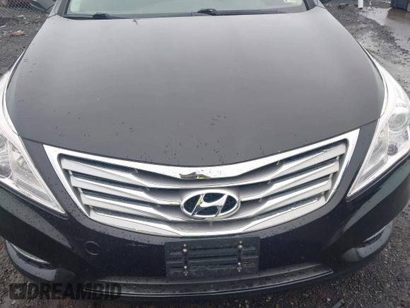 2013 Hyundai Azera z VIN KMHFH4JG5DA328645, wystawiony jako IAAI lot #42531226 z przebiegiem 82 403 mil mil oraz . Historia ofert i sprzedaży dostępna na DreamBid. Obrazek 6.
