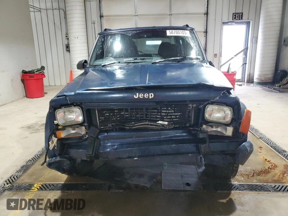 1995 Jeep Cherokee z VIN 1J4FN78S7SL537213, wystawiony jako Copart lot #58700105 z przebiegiem 261 606 mil mil oraz Szkoda całkowita • Salvage title. Historia ofert i sprzedaży dostępna na DreamBid. Obrazek 5.