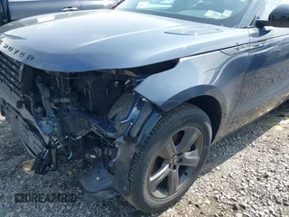 2025 Land Rover Range Rover Velar Dynamic SE with VIN SALYL2EX9SA809479, listed as a IAAI auction lot 42150495 with 7,038 mi miles and . Bid and sale history available at DreamBid. Image 19.