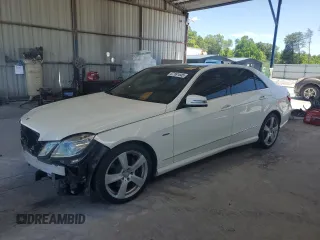 2012 Mercedes-Benz E 350 Luxury with VIN WDDHF5KB9CA591401, listed as a Copart auction lot 57161445 with 141,785 mi miles and Salvage title. Bid and sale history available at DreamBid. Image 1.