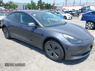 2023 Tesla Model 3 with VIN 5YJ3E1EA4PF400306, listed as a IAAI auction lot 42398603 with 18,551 mi miles and . Bid and sale history available at DreamBid. Image 1.