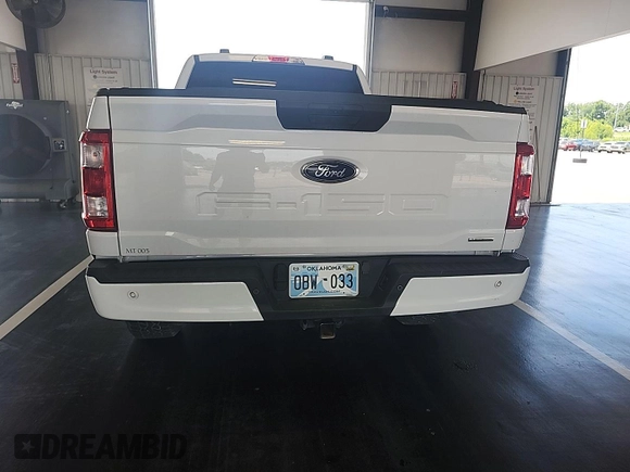2023 Ford F-150 XL with VIN 1FTEX1EP1PKD56789, listed as a IAAI auction lot 42802275 with 52,497 mi miles and . Bid and sale history available at DreamBid. Image 26.