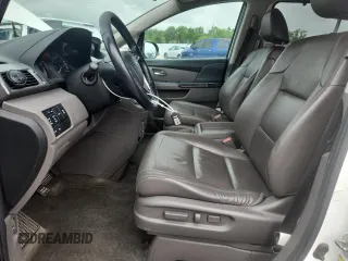 2014 Honda Odyssey Touring with VIN 5FNRL5H95EB083772, listed as a Copart auction lot 56713525 with 215,833 mi miles and Salvage title. Bid and sale history available at DreamBid. Image 7.