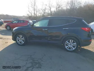 2014 Hyundai Santa Fe Sport with VIN 5XYZWDLA4EG137283, listed as a IAAI auction lot 41902510 with 142,467 mi miles. Bid and sale history available at carsss.com. Image 15.