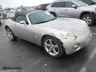 2006 Pontiac Solstice with VIN 1G2MB33B46Y106332, listed as a IAAI auction lot 41561521 with 165,224 mi miles. Bid and sale history available at carsss.com. Image 1.