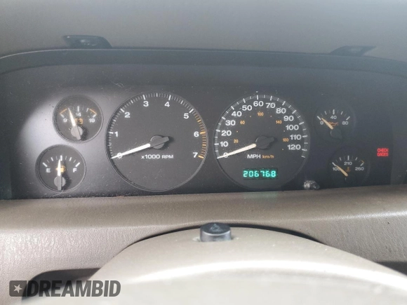 1999 Jeep Grand Cherokee Limited with VIN 1J4G268S3XC728805, listed as a Copart auction lot 79878974 with 206,768 mi miles and Salvage title. Bid and sale history available at DreamBid. Image 9.