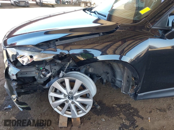 2016 Mazda CX-5 Sport with VIN JM3KE4BY8G0829002, listed as a IAAI auction lot 42553846 with 103,231 mi miles and . Bid and sale history available at DreamBid. Image 6.