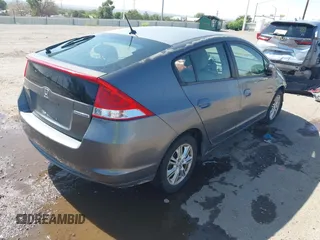 2011 Honda Insight EX z VIN JHMZE2H70BS011043, wystawiony jako IAAI lot #42537111 z przebiegiem 209 843 mil mil oraz . Historia ofert i sprzedaży dostępna na DreamBid. Obrazek 4.