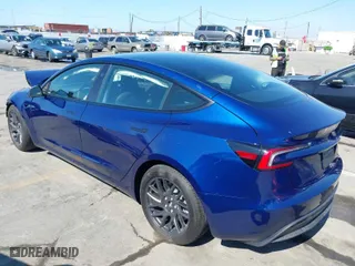 2025 Tesla Model 3 Long Range with VIN 5YJ3E1EB9SF886175, listed as a IAAI auction lot 41648473 with 395 mi miles. Bid and sale history available at carsss.com. Image 3.